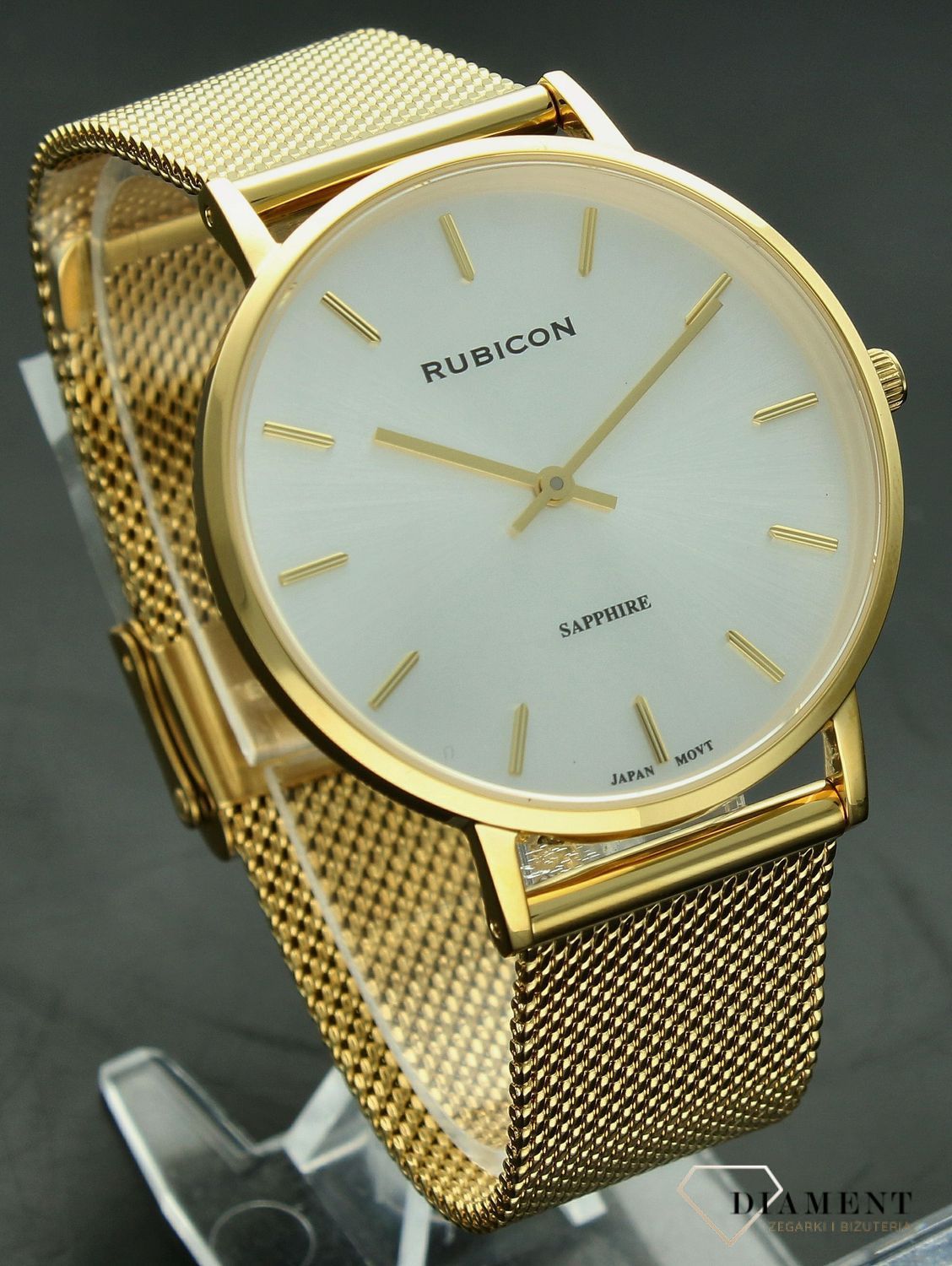 Zegarek damski Rubicon złoto-srebrny z szafirowym szkłem RNBD76. Zegarek damski na bransolecie. Zegarek damski Rubicon z indeksami. Zegarek damski biżuteryjny Rubicon. Elegancki zegarek w złotym kolorze na prezent..png